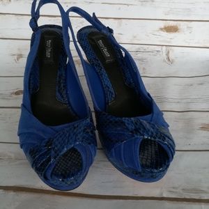 Peep toe platform slingbacks.